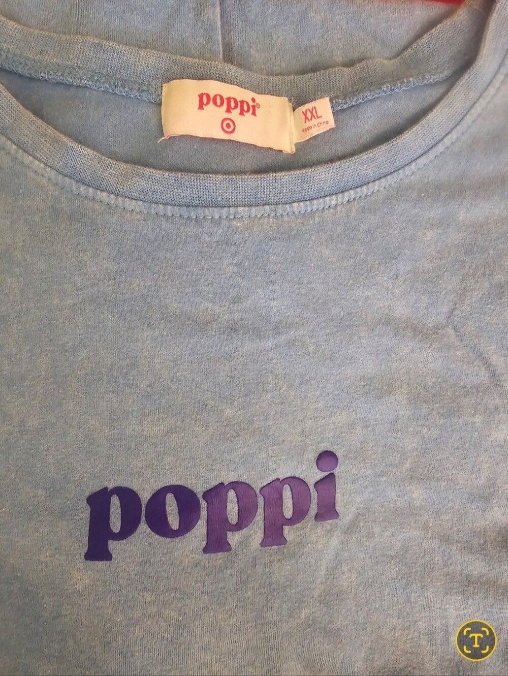 poppi light blue short sleeve tee with purple logo